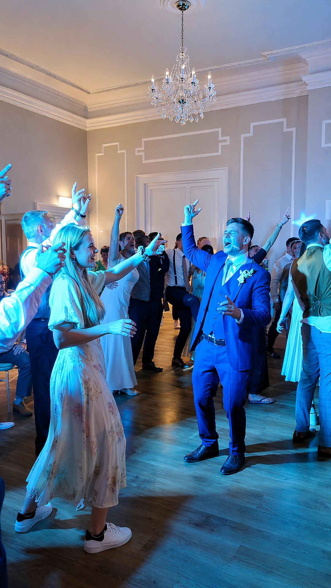 Elegant wedding dancefloor with guests enjoying the evening