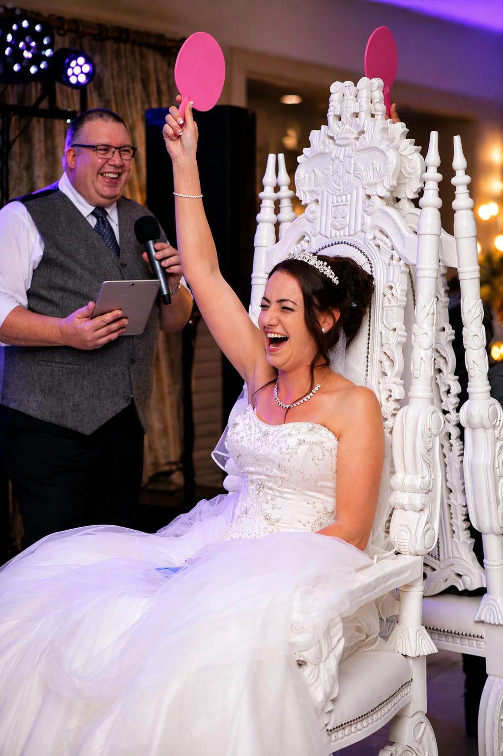 Bride enjoying a Mr and Mrs style wedding entertainment game hosted by DJ Mike Hackett