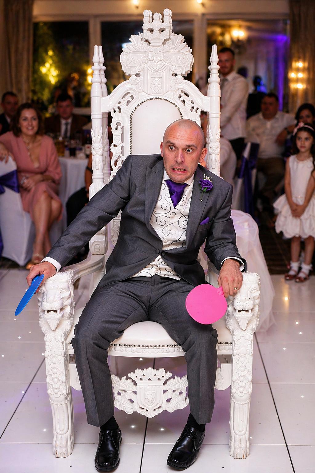 Guests enjoying a wedding entertainment game hosted by DJ Mike Hackett