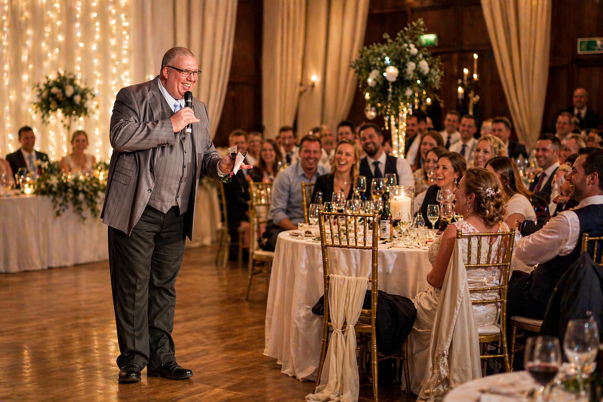 Professional wedding host DJ Mike Hackett entertaining guests during a wedding breakfast