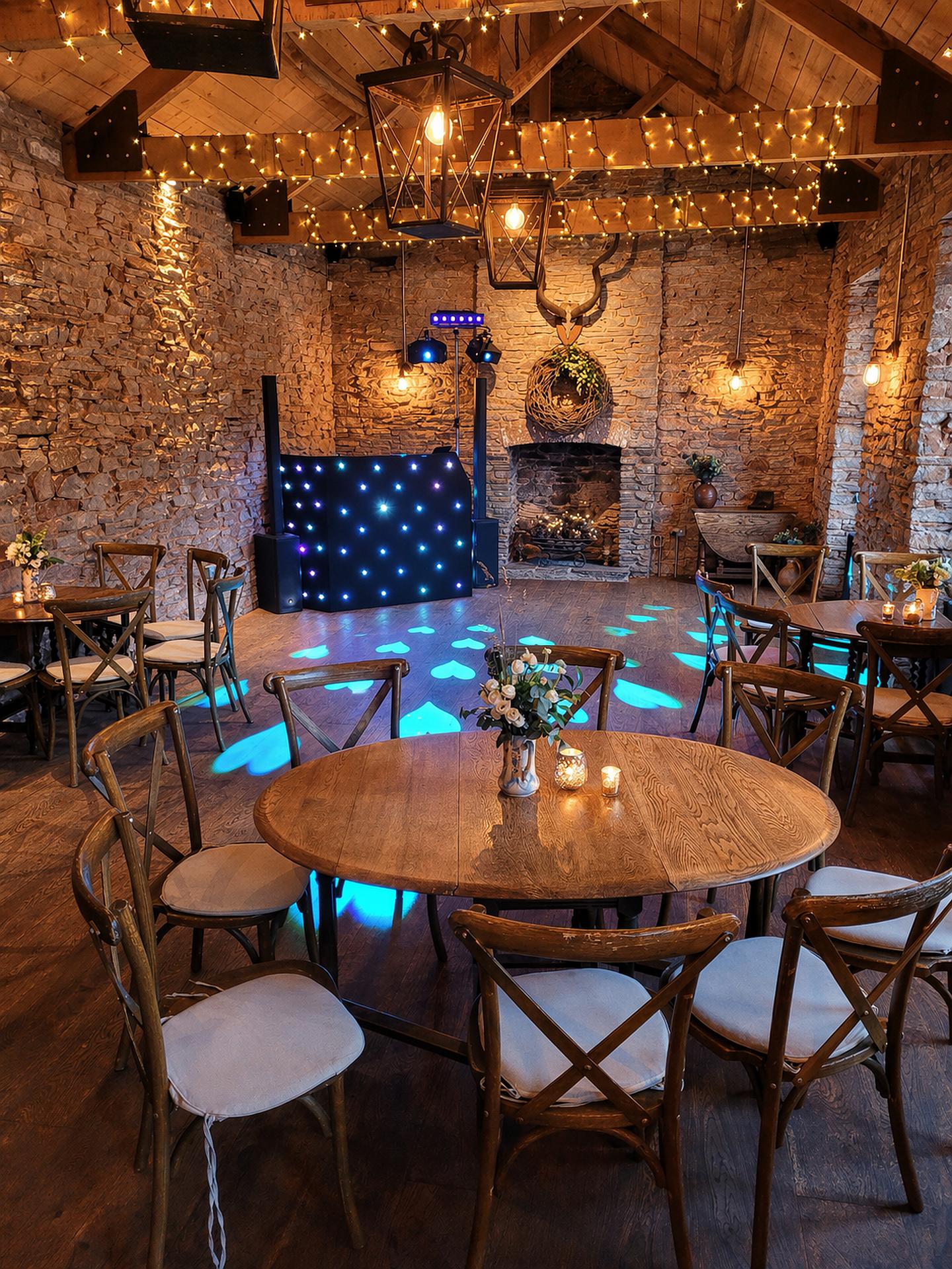 Rustic wedding venue DJ setup by DJ Mike Hackett