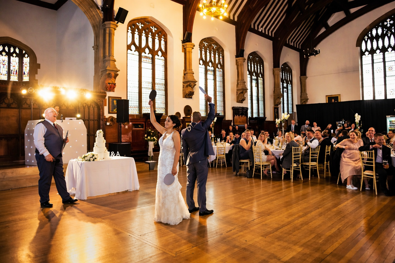 Newlyweds taking part in a wedding breakfast game hosted by DJ Mike Hackett