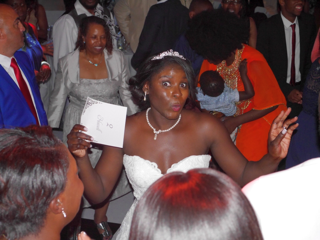 Happy bride enjoying an interactive wedding moment with DJ Mike Hackett