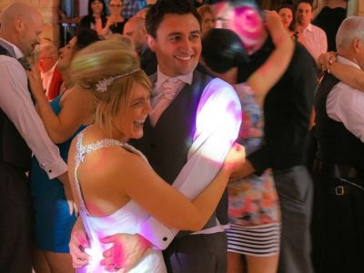 Happy couple on the dancefloor with DJ Mike Hackett